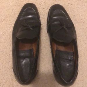 Black men’s Church’s loafers